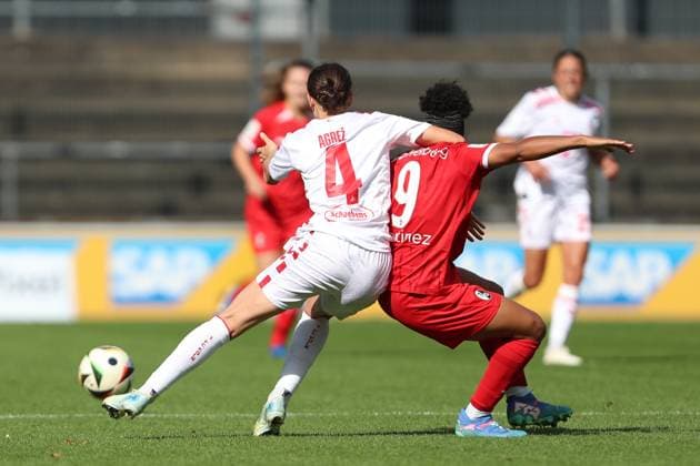 Sara Agrez 1 FC Koeln and Shekiera Martinez SC Freiburg in a duel during the Woman Bundesliga match between 1 FC Köln and SC Freiburg, Franz Kremer Stadion on September 28, 2024 in Cologne, Germany Photo by Oliver Kaelke DeFodi Images Sara Agrez 1 FC Koeln and Shekiera Martinez SC Freiburg battle for the ball during the Woman Bundesliga match between 1 FC Köln and SC Freiburg at Franz Kremer Stadion on September 28, 2024 in Köln, Germany Photo by Oliver Kaelke DeFodi Images DFL regulations prohibit any use of photographs as image sequences and or quasi video Defodi 003 678 2024 09 28 OK KOESCF 0848 Defodi-003 DFL regulations prohibit any use of photographs as image sequences and or quasi-video.