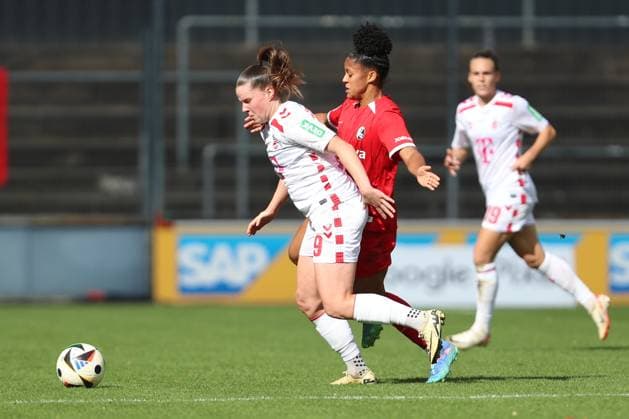 Adriana Achcinska 1 FC Koeln and Shekiera Martinez SC Freiburg in a duel during the Women Bundesliga match between 1 FC Köln and SC Freiburg, Franz Kremer Stadion on September 28, 2024 in Cologne, Germany, Germany Photo by Oliver Kaelke DeFodi Images Adriana Achcinska 1 FC Koeln and Shekiera Martinez SC Freiburg battle for the ball during the Woman Bundesliga match between 1 FC Köln and SC Freiburg at Franz Kremer Stadion on September 28, 2024 in Köln, Germany Photo by Oliver Kaelke DeFodi Images DFL regulations prohibit any use of photographs as image sequences and or quasi video Defodi 003 678 2024 09 28 OK KOESCF 0862 Defodi-003 DFL regulations prohibit any use of photographs as image sequences and or quasi-video.