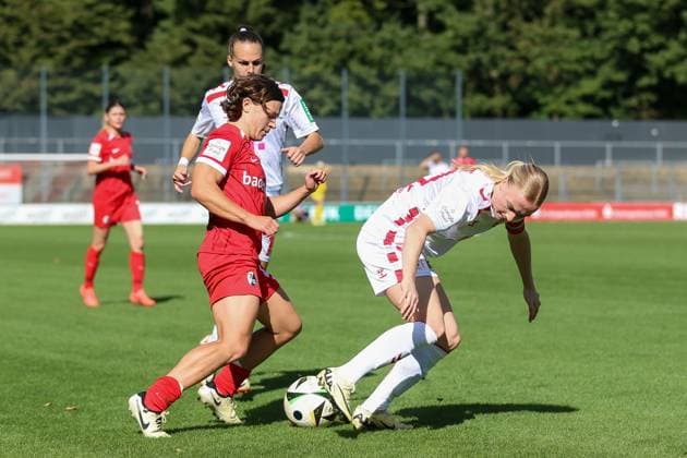 Alicia Sophie Gudorf SC Freiburg and Anna Gerhardt 1 FC Koeln in a duel during the Women Bundesliga match between 1 FC Köln and SC Freiburg, Franz Kremer Stadion on September 28, 2024 in Cologne, Germany Photo by Oliver Kaelke DeFodi Images Alicia Sophie Gudorf SC Freiburg and Anna Gerhardt 1 FC Koeln battle for the ball during the Woman Bundesliga match between 1 FC Köln and SC Freiburg at Franz Kremer Stadion on September 28, 2024 in Köln, Germany Photo by Oliver Kaelke DeFodi Images DFL regulations prohibit any use of photographs as image sequences and or quasi video Defodi 003 678 2024 09 28 OK KOESCF 0992 Defodi-003 DFL regulations prohibit any use of photographs as image sequences and or quasi-video.