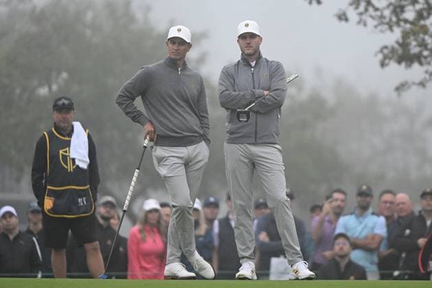 September 28, 2024, Montreal, Pq, Canada: Adam Scott, left, of Australia, and Taylor Pendrith, of Canada, look on at the first green during third round four-ball play at the Presidents Cup golf tournament at Royal Montreal Golf Club, in Montreal, Saturday, Sept. 28, 2024. Canada News - September 28, 2024 - ZUMAc35_ 20240928_zaf_c35_009 Copyright: xGrahamxHughesx