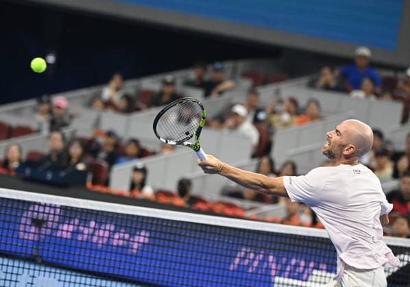 (240928) -- BEIJING, Sept. 28, 2024 -- Adrian Mannarino hits a return during the men s singles second round match between Daniil Medvedev of Russia and Adrian Mannarino of France at 2024 China Open tennis tournament in Beijing, capital of China, Sept. 28, 2024. ) (SP)CHINA-BEIJING-TENNIS-CHINA OPEN-MEN S SINGLES (CN) ZhangxLong 