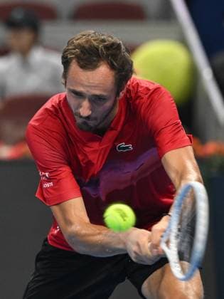 (240928) -- BEIJING, Sept. 28, 2024 -- Daniil Medvedev hits a return during the men s singles second round match between Daniil Medvedev of Russia and Adrian Mannarino of France at 2024 China Open tennis tournament in Beijing, capital of China, Sept. 28, 2024. ) (SP)CHINA-BEIJING-TENNIS-CHINA OPEN-MEN S SINGLES (CN) ZhangxLong 