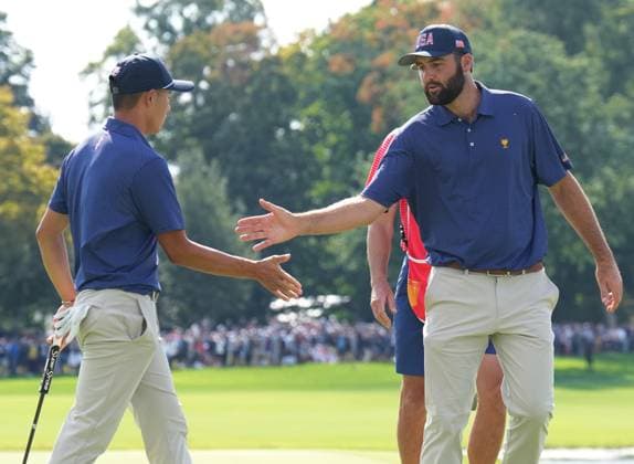 September 28, 2024, Montreal, Pq, Canada: United States team member Scottie Scheffler, right, shakes hands with partner United States team member Collin Morikawa after making a putt on the 15th hole during their third round four-ball match at the Presidents Cup golf tournament at Royal Montreal Golf Club in Montreal Saturday, Sept. 28, 2024. Scottie Scheffler, Collin Morikawa, - ZUMAc35_ 20240928_zaf_c35_066 Copyright: xNathanxDenettex