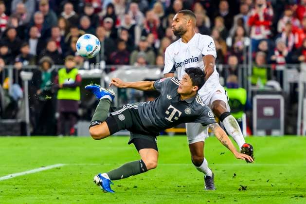 GER, DFB, FC Bayern Muenchen vs Bayer 04 Leverkusen 28 09 2024, Allianz Arena, Muenchen, GER, DFB, FC Bayern Muenchen vs Bayer 04 Leverkusen , in picture Min jae Kim FCB 3 in duel against Jonathan Tah Leverkusen 4 nordphotoxGmbHx xStraubmeier nph00004