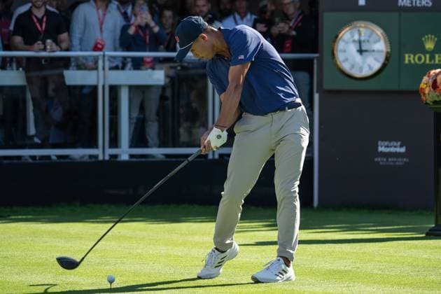 MONTREAL, QC - SEPTEMBER 28: Team USA golfer Collin Morikawa plays his shot from the first tee at the 2024 Presidents Cup on September 28, 2024 at The Royal Montreal Golf Club in Montreal, QC (Photo by Vincent Ethier Icon Sportswire) GOLF: SEP 28 Presidents Cup EDITORIAL USE ONLY Icon2409280780