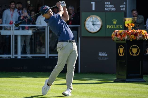 MONTREAL, QC - SEPTEMBER 28: Team USA golfer Collin Morikawa plays his shot from the first tee at the 2024 Presidents Cup on September 28, 2024 at The Royal Montreal Golf Club in Montreal, QC (Photo by Vincent Ethier Icon Sportswire) GOLF: SEP 28 Presidents Cup EDITORIAL USE ONLY Icon2409280785