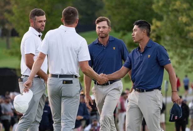 September 28, 2024, Montreal, Pq, CANADA: United States team member Collin Morikawa, right, and Sam Burns shake hands with International team member Corey Conners of Canada, left, and Mackenzie Hughes of Canada, following their win on the 18th hole during their fourth round foursomes match at the Presidents Cup golf tournament at Royal Montreal Golf Club in Montreal Saturday, Sept. 28, 2024. Canada News - September 28, 2024 - ZUMAc35_ 20240928_zaf_c35_191 Copyright: xChristinnexMuschix