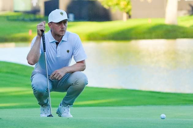 September 28, 2024, Montreal, Quebec, USA: Mackenzie Hughes (CAN) lines up a putt on the 14th green during Day 3 of the 2024 Presidents Cup at The Royal Montreal Golf Club. Montreal USA - ZUMAw109 20240928_fap_w109_051 Copyright: xDebbyxWongx