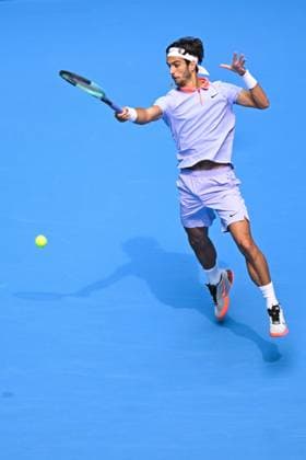 (240929) -- BEIJING, Sept. 29, 2024 -- Lorenzo Musetti hits a return during the men s singles second round match between Bu Yunchaokete of China and Lorenzo Musetti of Italy at 2024 China Open tennis tournament in Beijing, capital of China, Sept. 29, 2024. ) (SP)CHINA-BEIJING-TENNIS-CHINA OPEN-MEN S SINGLES (CN) ZhangxLong 