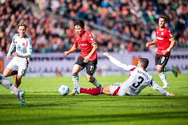 29 09 2024 Soccer, 2024 2025, 2 Bundesliga, Matchday 7, Hannover 96 1 FC Nürnberg L R Hyun ju Lee Hannover , Danilo Soares Nürnberg DFL REGULATIONS PROHIBIT ANY USE OF PHOTOGRAPHS AS IMAGE SEQUENCES AND OR QUASI VIDEO
