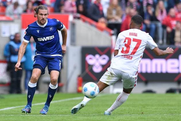 Soccer 2 Bundesliga 7 Matchday 1 FC Köln Karlsruher SC on 29 09 2024 at RheinEnergieStadion in Cologne Sebastian Jung Karlsruhe , left Linton Maina Köln , right DFL regulations prohibit any use of photographs as image sequences and or quasi video xRx
