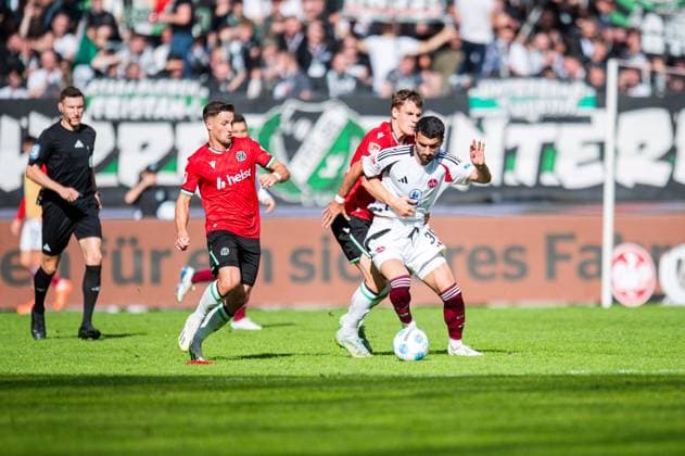 29 09 2024 Soccer, 2024 2025, 2 Bundesliga, 7 Matchday, Hannover 96 1 FC Nürnberg L R Enzo Leopold Hannover , Mahir Emreli Nürnberg , Max Christiansen Hannover DFL REGULATIONS PROHIBIT ANY USE OF PHOTOGRAPHS AS IMAGE SEQUENCES AND OR QUASI VIDEO