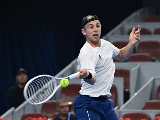 (240929) -- BEIJING, Sept. 29, 2024 -- Tallon Griekspoor hits a return during the men s singles second round match between Carlos Alcaraz of Spain and Tallon Griekspoor of the Netherlands at 2024 China Open tennis tournament in Beijing, capital of China, Sept. 29, 2024. ) (SP)CHINA-BEIJING-TENNIS-CHINA OPEN-MEN S SINGLES (CN) ZhangxLong 