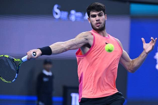 (240929) -- BEIJING, Sept. 29, 2024 -- Carlos Alcaraz hits a return during the men s singles second round match between Carlos Alcaraz of Spain and Tallon Griekspoor of the Netherlands at 2024 China Open tennis tournament in Beijing, capital of China, Sept. 29, 2024. ) (SP)CHINA-BEIJING-TENNIS-CHINA OPEN-MEN S SINGLES (CN) ZhangxLong 