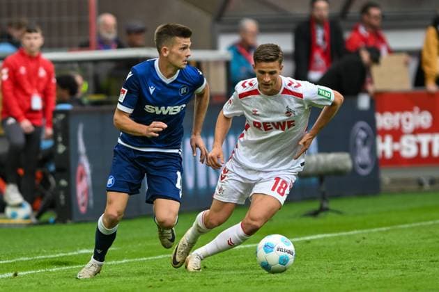 from left in duel David Herold Karlsruhe 20 Rasmus Carstensen Koeln 18 29 09 2024 Soccer 1 FC Koeln vs Karlsruher SC, Rheinenergiestadion, Koeln, DFB DFL REGULATIONS PROHIBIT ANY USE OF PHOTOGRAPHS AS IMAGE SEQUENCES AND OR QUASI VIDEO NRW Germany Copyright: xpepphotox xSaschaxWeizx pep00321, pep_20240929_hm_1493