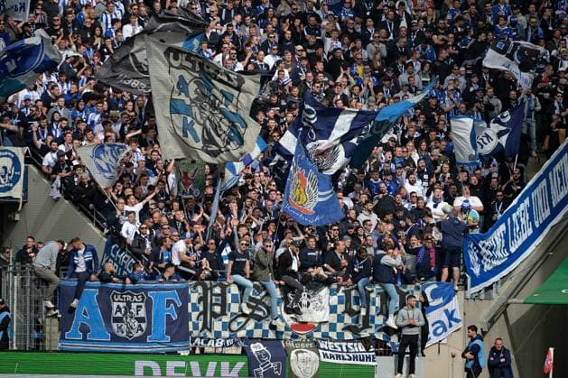 29 09 2024, xjpx, Soccer 2 Bundesliga, 1 FC Koeln Karlsruher SC emspor, v l Fans from Karlsruhe at the RheinEnergie Stadium in Cologne DFL DFB REGULATIONS PROHIBIT ANY USE OF PHOTOGRAPHS as IMAGE SEQUENCES and or QUASI VIDEO Koeln