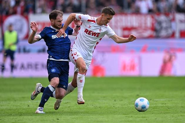 Koeln, Rheinenergiestadion, 29 09 24, GER, Herren, 2 Bundesliga, Saison 2024 2025, 1 FC Koeln Karlsruher SC Bild v li im Zweikampf Budu ZIVZIVADZE Karlsruhe und Rasmus CARSTENSEN Koeln Only for editorial use DFL regulations prohibit any use of photographs as image sequences and or quasi video NRW Deutschland