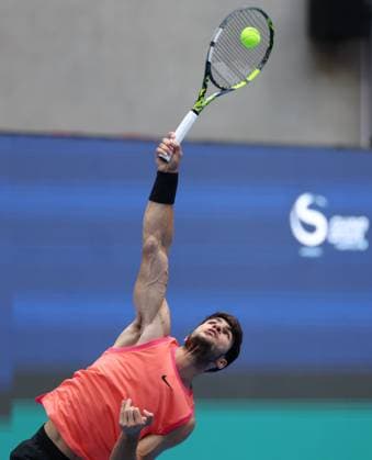 (240930) -- BEIJING, Sept. 30, 2024 -- Carlos Alcaraz of Spain serves during the men s singles quarterfinals against Karen Khachanov of Russia at 2024 China Open tennis tournament in Beijing, capital of China, Sept. 30, 2024. ) (SP)CHINA-BEIJING-TENNIS-CHINA OPEN-MEN S SINGLES (CN) ZhangxChenlin 