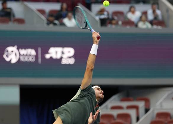 (240930) -- BEIJING, Sept. 30, 2024 -- Karen Khachanov of Russia serves during the men s singles quarterfinals against Carlos Alcaraz of Spain at 2024 China Open tennis tournament in Beijing, capital of China, Sept. 30, 2024. ) (SP)CHINA-BEIJING-TENNIS-CHINA OPEN-MEN S SINGLES (CN) ZhangxChenlin 