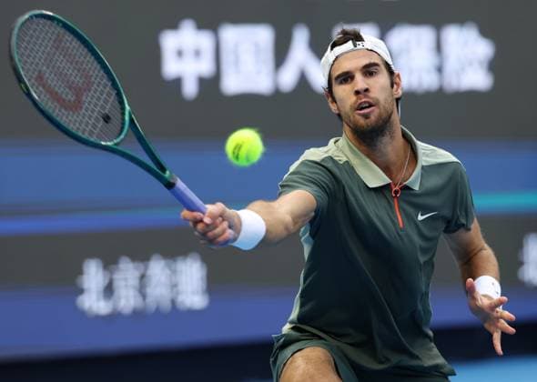 (240930) -- BEIJING, Sept. 30, 2024 -- Karen Khachanov of Russia competes during the men s singles quarterfinals against Carlos Alcaraz of Spain at 2024 China Open tennis tournament in Beijing, capital of China, Sept. 30, 2024. ) (SP)CHINA-BEIJING-TENNIS-CHINA OPEN-MEN S SINGLES (CN) ZhangxChenlin 