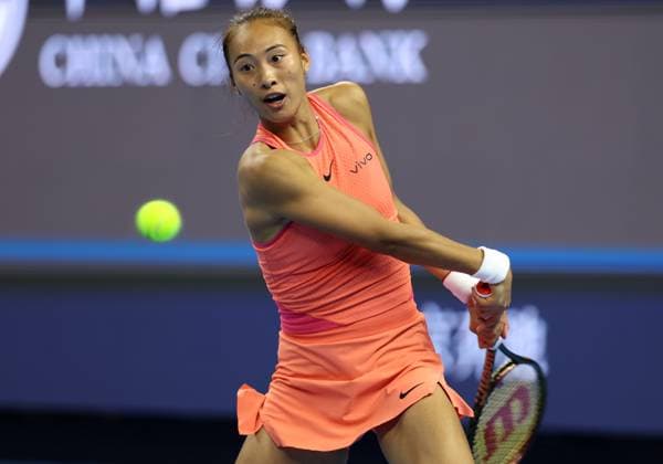(240930) -- BEIJING, Sept. 30, 2024 -- Zheng Qinwen of China hits a return during the women s singles 3rd round match against Nadia Podoroska of Argentina at 2024 China Open tennis tournament in Beijing, capital of China, Sept. 30, 2024. ) (SP)CHINA-BEIJING-TENNIS-CHINA OPEN-WOMEN S SINGLES (CN) ZhangxChenlin 