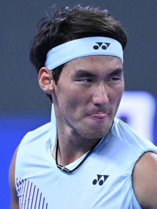 (240930) -- BEIJING, Sept. 30, 2024 -- Bu Yunchaokete reacts during the men s singles quarterfinal between Bu Yunchaokete of China and Andrey Rublev of Russia at 2024 China Open tennis tournament in Beijing, capital of China, Sept. 30, 2024. ) (SP)CHINA-BEIJING-TENNIS-CHINA OPEN-MEN S SINGLES (CN) ZhangxLong 