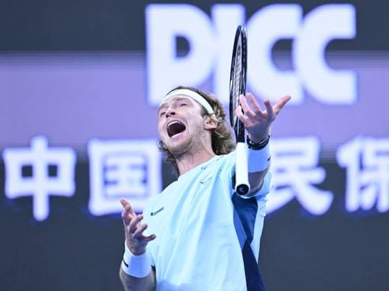 (240930) -- BEIJING, Sept. 30, 2024 -- Andrey Rublev reacts after losing a point during the men s singles quarterfinal between Bu Yunchaokete of China and Andrey Rublev of Russia at 2024 China Open tennis tournament in Beijing, capital of China, Sept. 30, 2024. ) (SP)CHINA-BEIJING-TENNIS-CHINA OPEN-MEN S SINGLES (CN) ZhangxLong 