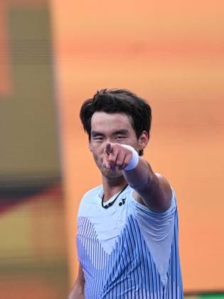 (240930) -- BEIJING, Sept. 30, 2024 -- Bu Yunchaokete celebrates after winning the men s singles quarterfinal between Bu Yunchaokete of China and Andrey Rublev of Russia at 2024 China Open tennis tournament in Beijing, capital of China, Sept. 30, 2024. ) (SP)CHINA-BEIJING-TENNIS-CHINA OPEN-MEN S SINGLES (CN) ZhangxLong 
