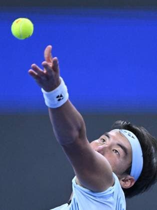 (240930) -- BEIJING, Sept. 30, 2024 -- Bu Yunchaokete serves during the men s singles quarterfinal between Bu Yunchaokete of China and Andrey Rublev of Russia at 2024 China Open tennis tournament in Beijing, capital of China, Sept. 30, 2024. ) (SP)CHINA-BEIJING-TENNIS-CHINA OPEN-MEN S SINGLES (CN) ZhangxLong 