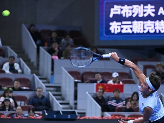 (240930) -- BEIJING, Sept. 30, 2024 -- Bu Yunchaokete serves during the men s singles quarterfinal between Bu Yunchaokete of China and Andrey Rublev of Russia at 2024 China Open tennis tournament in Beijing, capital of China, Sept. 30, 2024. ) (SP)CHINA-BEIJING-TENNIS-CHINA OPEN-MEN S SINGLES (CN) ZhangxLong 