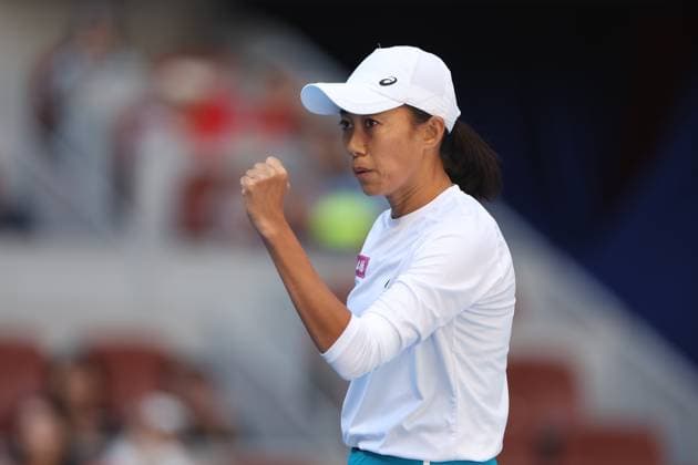 (241001) -- BEIJING, Oct. 1, 2024 -- Zhang Shuai of China celebrates during the women s singles round of 16 match against Magdalena Frech of Poland at 2024 China Open tennis tournament in Beijing, capital of China, Oct. 1, 2024. ) (SP)CHINA-BEIJING-TENNIS-CHINA OPEN-WOMEN S SINGLES (CN) BaixXuefei 
