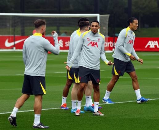 1st October 2024; Anfield and AXA Training Centre, Liverpool, Merseyside, England; press conference, PK, Pressekonferenz and training session ahead of the UEFA Champions League match between Liverpool and Bologna in Liverpool, England; Trent Alexander-Arnold of Liverpool shares a joke with Alexis Mac Allister during today s training session at Liverpool s AXA Training Centre in Kirkby ahead of tomorrow s Champions League match versus Bologna  ActionPlus12698674 AlanxMartin