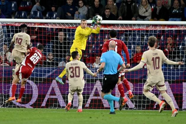 Goalkeeper Marco Bizot of Brest (C) in action during the UEFA Champions League, League phase football match between Salzburg and Brest FOOTBALL : Salzbourg Vs Brest - Ligue des Champions - 01 10 2024 IgorKupljenik Panoramic 