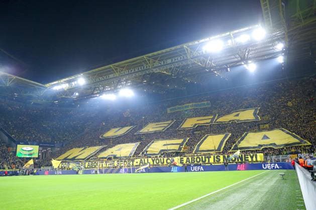 01 10 2024, Football, UEFA Champions League, Borussia Dortmund Celtic Glasgow, Matchday 2, Signal Iduna Park, Season 2024 2025 Choreography of the Ultras in the Yellow Wall Banner Protest Banner Lettering UEFA Mafia Choreo Fans Protest Fan Protest North Rhine-Westphalia Germany