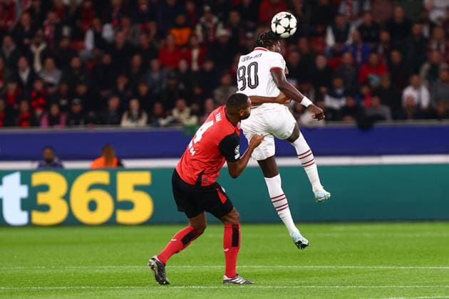 Jonathan Tah 4 Bayer 04 Leverkusen in duel, action, with Tammy Abraham 90 AC Milan Bayer 04 Leverkusen vs AC Milan, Soccer, UEFA Champions League, Matchday 2, 01 10 2024 Photo kolbert press Ant Palmer BayArena NRW Germany Copyright: xkolbert-press AntxPalmerx