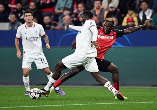 01 10 2024, xjhx, Football UEFA Champions League, Bayer 04 Leverkusen AC Milan emspor, v l Youssouf Fofana AC Milan , Victor Boniface Bayer Leverkusen UEFA REGULATIONS PROHIBIT ANY USE OF PHOTOGRAPHS as IMAGE SEQUENCES and or QUASI VIDEO Leverkusen