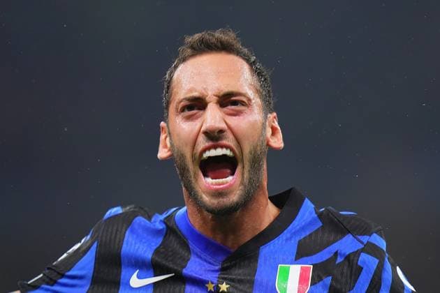 Inter Milan s Hakan Calhanoglu celebrates after scoring 1-0 during the Uefa Champions League soccer match between Inter and Fc Crvena at the San Siro Stadium in Milan, north Italy -Tuesday , October 1th , 2024. - Soccer .  Copyright: xSpada LaPressex
