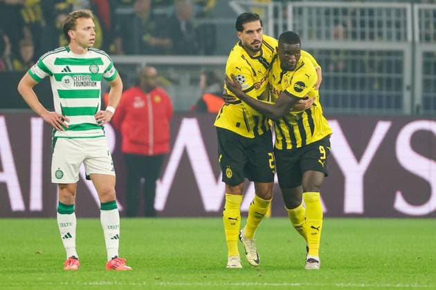 UEFA Champions League Borussia Dortmund Celtic Glasgow on 01 10 2024 at Signal Iduna Park in Dortmund Cheering, goal celebration, goal scorer Emre Can Dortmund 23 cheers after his goal to make it 1 - 0 with Serhou Guirassy Dortmund 9 , Alistair Johnston Celtic 2 looks dissatisfied, disappointed, disappointed, dejected MH