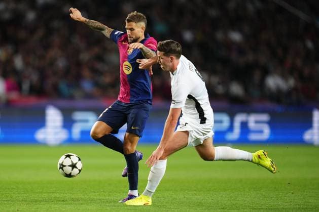 Jaouen Hadjam of BSC Young Boys AG and Inigo Martinez of FC Barcelona, Barca FC Barcelona v BSC Young Boys. UEFA Champions League match. Date 2. Football, Lluis Companys Stadium, Barcelona, Spain - 1 oct 2024 Editorial use only  Copyright: xBlanco PRESSINPHOTO Shutterstockx 14751131b