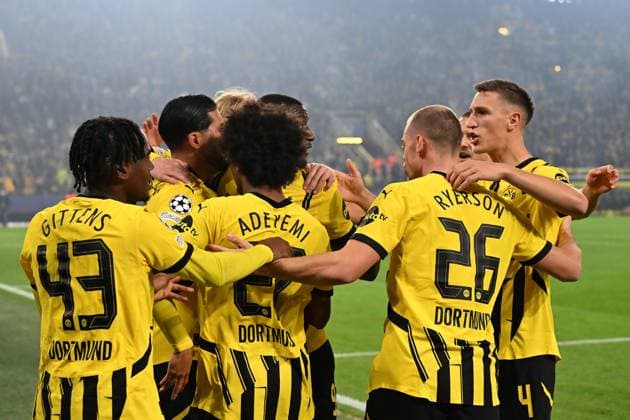 Emre Can Borussia Dortmund goal celebration, celebrates after scoring his team™s first goal with teammates during the UEFA Champions League 2024 25 League Phase 2 match between Borussia Dortmund and Celtic Glasgow, SIGNAL IDUNA PARK on October 01, 2024 in Dortmund, Germany, Germany Photo by Ralf Treese DeFodi Images Emre Can Borussia Dortmund celebrates after scoring his team™s first goal with teammates during the UEFA Champions League 2024 25 League Phase MD2 match between Borussia Dortmund and Celtic FC at Signal Iduna Park on October 1, 2024 in Dortmund, Germany Defodi 521 BVBCEL20241001 024 Defodi-521