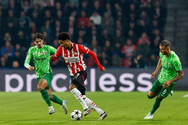 EINDHOVEN, 12-05-2019, Philips stadium. Dutch football, Champions League, season 2024-2025. Player PSV Malik Tillman vs Player Sporting CP Zeno Debast PSV - Sporting CP  x26368950x Copyright: