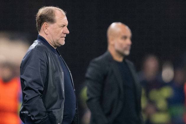 Vladimir Weiss sr. and Pep Guardiola behind during UEFA Champions league match, SK Slovan Bratislava - Manchester City , 01. october 2024 Copyright: xMICHALxFAJT,ZOSPORTU.SKx DSC_2343