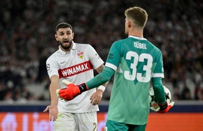 Jeff Chabot VfB Stuttgart 24 challenges ball from goalkeeper Alexander Nuebel VfB Stuttgart 33 Champions League VfB Stuttgart vs AC Sparta Prague 01 10 2024 DFL REGULATIONS PROHIBIT ANY USE OF PHOTOGRAPHS AS IMAGE SEQUENCES AND OR QUASI VIDEO VfB Stuttgart vs AC Sparta Prague