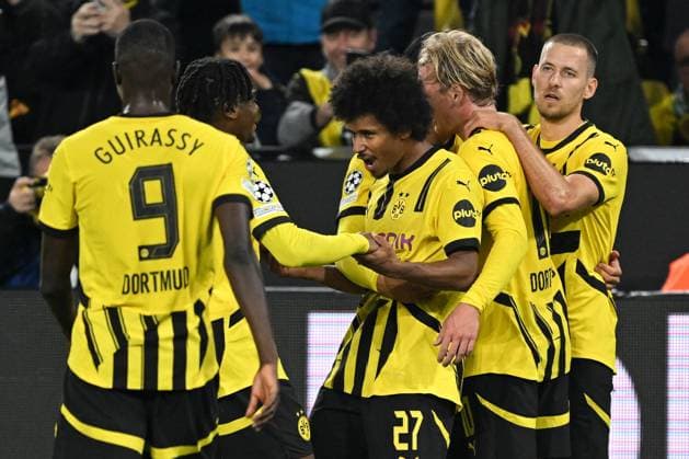 Karim Adeyemi of Borussia Dortmund celebrates scoring the goal for their side with their teammates to make it 3-1 Borussia Dortmund v Celtic, UEFA Champions League, Group Stage, Football, Signal Iduna Park, Dortmund, Germany, 01 Oct 2024 EDITORIAL USE ONLY No use with unauthorised audio, video, data, fixture lists, club league logos or live services. Online in-match use limited to 120 images, no video emulation. No use in betting, games or single club league player publications. Copyright: xMichaelxTitgemeyer Shutterstockx 14750161ab