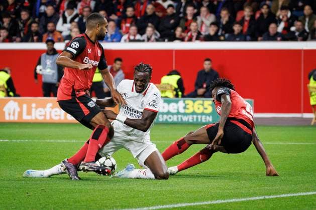 UEFA Champions League, Bayer 04 Leverkusen AC Milan 01 10 2024 Tammy Abraham AC Milan, 90 fights in the penalty area against Jonathan Tah Bayer 04 Leverkusen, 4 and Edmond Tapsoba Bayer 04 Leverkusen, 12 UEFA Champions League, Bayer 04 Leverkusen AC Milan, matchday 2 on 01 10 2024 at BayArena in Leverkusen Copyright: xBEAUTIFULxSPORTS AxelxKohringx
