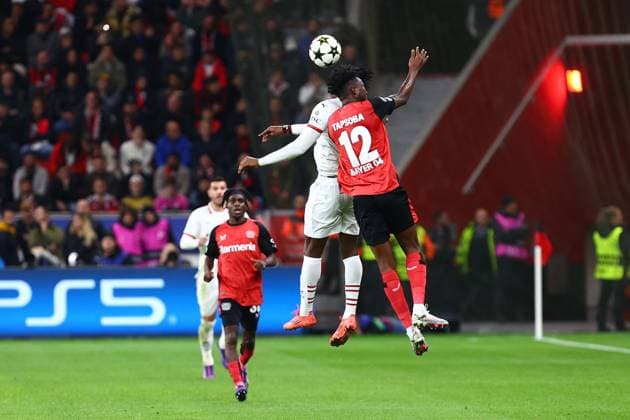Rafael Leao 10 AC Milan in duel, action, with Edmond Tapsoba 12 Bayer 04 Leverkusen Bayer 04 Leverkusen vs AC Milan, Soccer, UEFA Champions League, Matchday 2, 01 10 2024 Photo kolbert press Ant Palmer BayArena NRW Germany Copyright: xkolbert-press AntxPalmerx