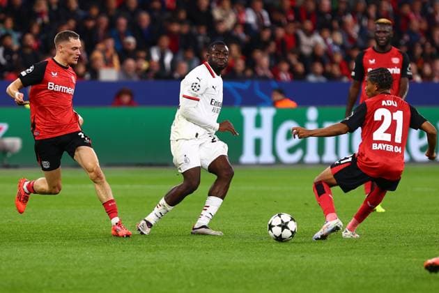 Youssouf Fofana 29 AC Milan in duel, action, with Amine Adli 21 Bayer 04 Leverkusen Bayer 04 Leverkusen vs AC Milan, Soccer, UEFA Champions League, Matchday 2, 01 10 2024 Photo kolbert press Ant Palmer BayArena NRW Germany Copyright: xkolbert-press AntxPalmerx