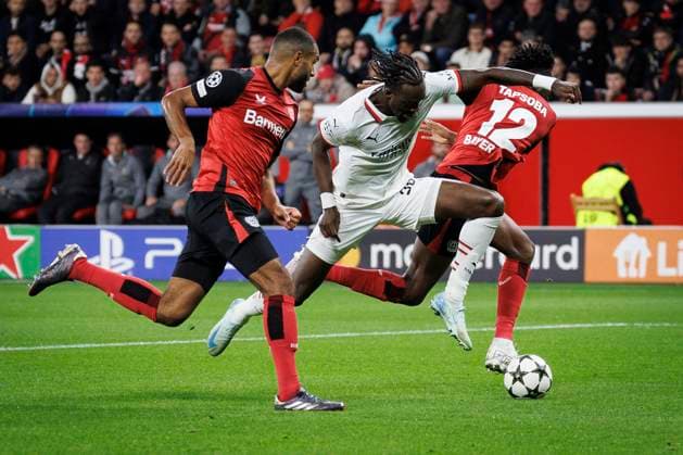 UEFA Champions League, Bayer 04 Leverkusen AC Milan 01 10 2024 Tammy Abraham AC Milan, 90 fights in the penalty area against Jonathan Tah Bayer 04 Leverkusen, 4 and Edmond Tapsoba Bayer 04 Leverkusen, 12 UEFA Champions League, Bayer 04 Leverkusen AC Milan, matchday 2 on 01 10 2024 at BayArena in Leverkusen Copyright: xBEAUTIFULxSPORTS AxelxKohringx
