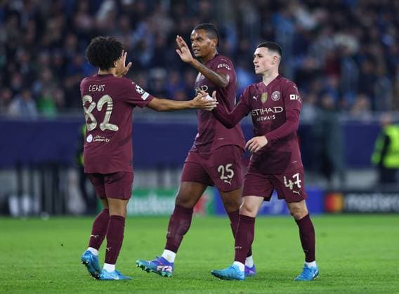 Phil Foden of Manchester City celebrates scoring their sides second goal with team-mate Rico Lewis Slovan Bratislava v Manchester City, UEFA Champions League, Group Stage, Football, Tehelne pole, Bratislava, Slovakia, 01 Oct 2024 EDITORIAL USE ONLY No use with unauthorised audio, video, data, fixture lists, club league logos or live services. Online in-match use limited to 120 images, no video emulation. No use in betting, games or single club league player publications. Copyright: xMichaelxZemanek Shutterstockx 14750163s