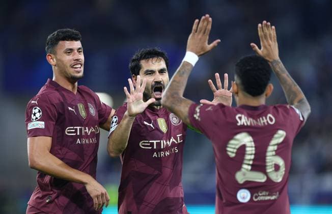 Ilkay Gundogan of Manchester City celebrates scoring the opening goal with team-mate Matheus Nunes and Savinho Slovan Bratislava v Manchester City, UEFA Champions League, Group Stage, Football, Tehelne pole, Bratislava, Slovakia, 01 Oct 2024 EDITORIAL USE ONLY No use with unauthorised audio, video, data, fixture lists, club league logos or live services. Online in-match use limited to 120 images, no video emulation. No use in betting, games or single club league player publications. Copyright: xMichaelxZemanek Shutterstockx 14750163r